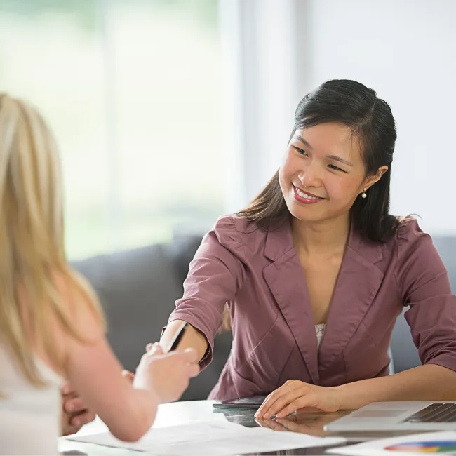 A financial planner discussing budgets with a client