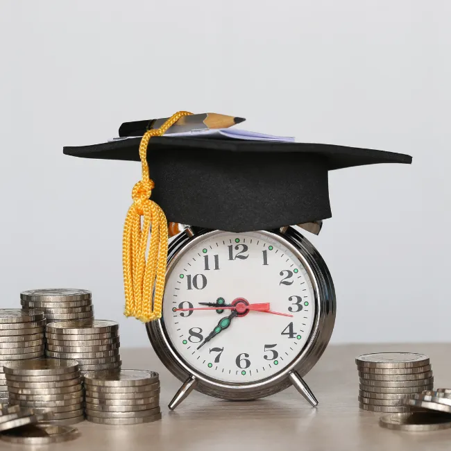 A financial planner discussing student loans with a young graduate